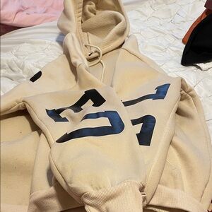 Beige Hoodie with Black Print